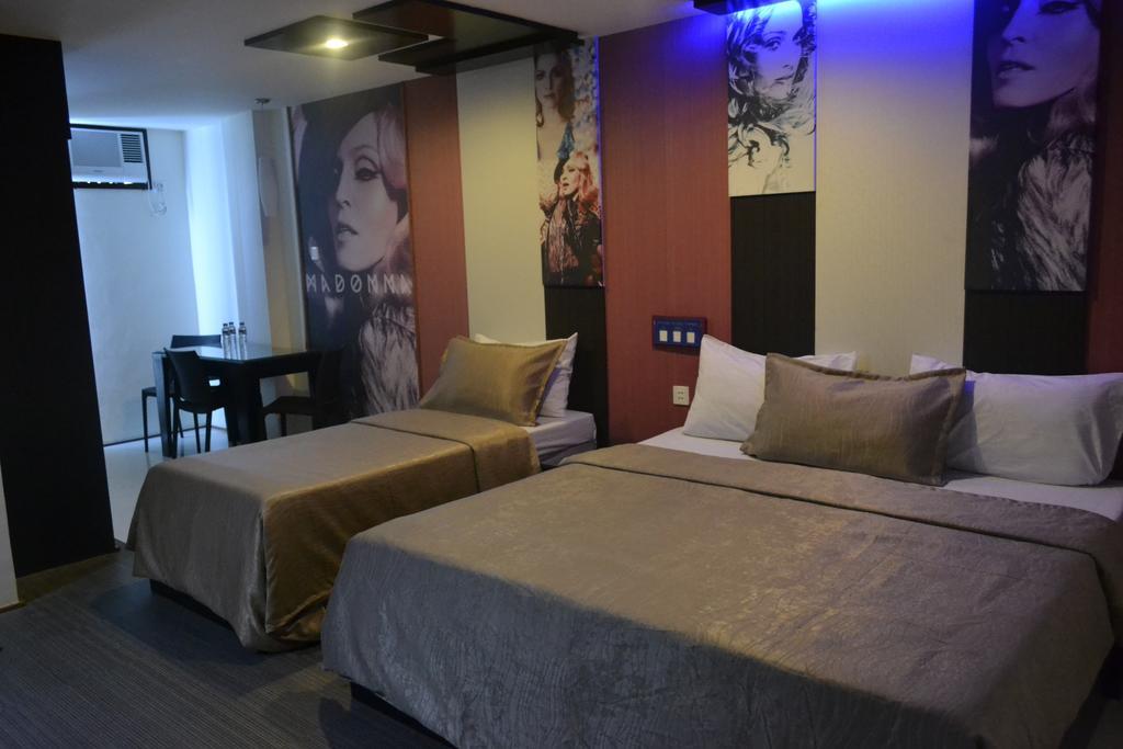 Icon Hotel North Edsa Cidade Quezon Quarto foto