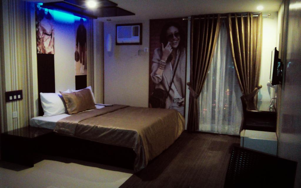 Icon Hotel North Edsa Cidade Quezon Quarto foto