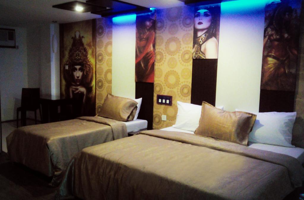 Icon Hotel North Edsa Cidade Quezon Quarto foto