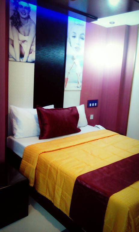 Icon Hotel North Edsa Cidade Quezon Quarto foto