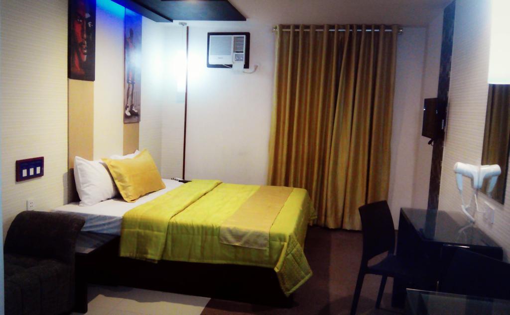 Icon Hotel North Edsa Cidade Quezon Quarto foto
