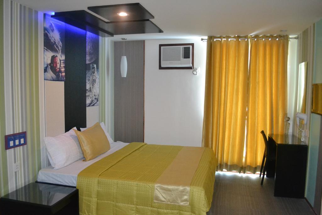 Icon Hotel North Edsa Cidade Quezon Quarto foto