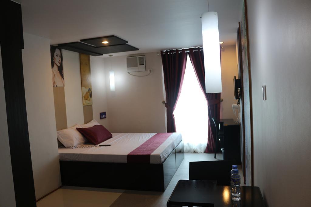 Icon Hotel North Edsa Cidade Quezon Quarto foto